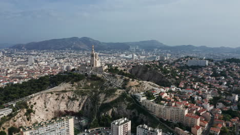 Aerial-view-of-Notre-Dame-de-la-Garde-on-Marseille-hill-France