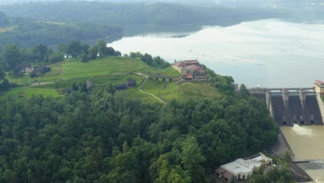 Doboszyce-Castle-and-Water-Dam-near-Cracow,-Poland-water,dam,lake,green,tree,fog,trees,blue