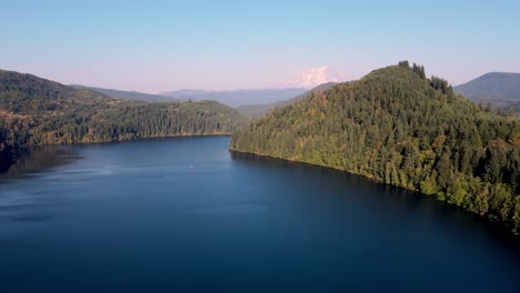 Mineral-Lake-Resort-in-Mineral-Washington-aerial-4k-drone-shot-over-water-with-Mt-Rainer-in-background