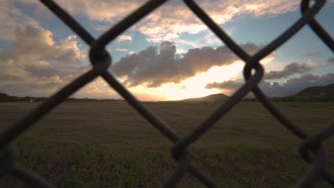 Sunset-with-a-fence-foreground
