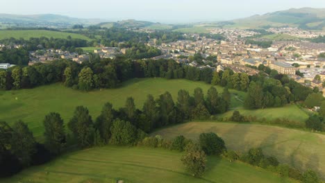 Drone-view-of-Aireville-Park-in-Skipton-England-at-sunset-showing-large-empty-park