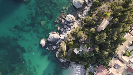 Top-down-aerial-over-Golfo-beach-on-idyllic-Ionian-coast,-Parga,-Epirus,-Greece