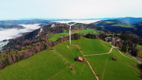 Annäherung-An-Eine-Sich-Drehende-Windkraftanlage-An-Einem-Sonnigen-Herbstnachmittag-Auf-Einem-Schweizer-Juraberg-30fps-4k