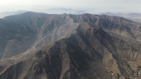 Drone-shot-of-the-vast-hills-in-the-desert-in-Lima-Peru
