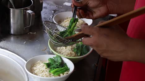 Preparing-chicken-noodles