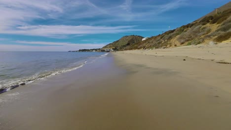 Drone-footage-over-the-surf-in-Malibu-Beach-California