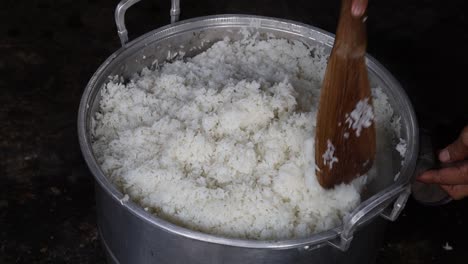 Someone-is-cooking-rice-in-the-pot