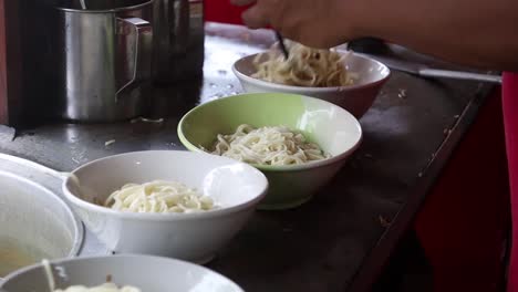 Preparing-chicken-noodles