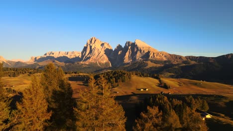 Mountains,-forest-grass-fields-at-Alpe-di-Siusi-in-Alps,-Italian-Dolomites-filmed-in-vibrant-colors-at-sunset