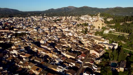 Mallorca-village-view-with-mountains-in-the-background-flying-back