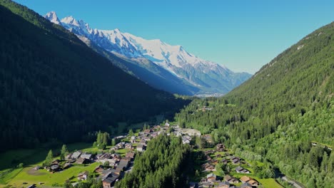 Mont-Blanc-Glacier-and-Chamonix-Village-during-Sunny-Summer-day---Aerial