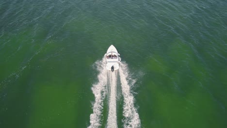 Aerial-View-Of-Speedboat-Racing-Across-Ocean-Waters-Off-Isla-Mujeres