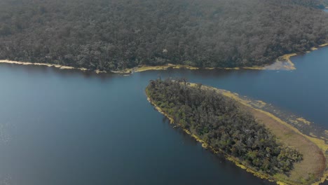 Aerial-shot-of-islands-on-a-lake-out-in-the-Australian-bush