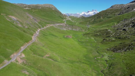 Scenic-Road-and-Mountain-Pass-Col-de-la-Croix-de-Fer-in-French-Alps---Aerial