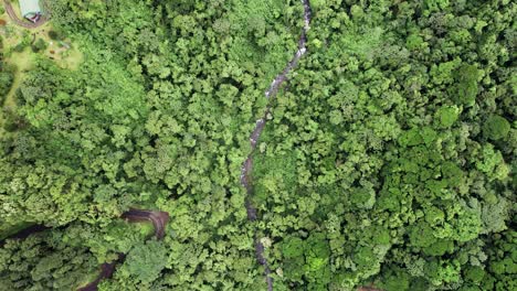 Jungle-river-flowing-in-rainforest-valley-in-La-Fortuna,-Costa-Rica