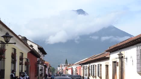 The-beautiful-city-of-Antigua-with-the-highest-volcano-as-background,-Guatemala