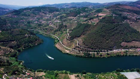 Douro-river-valley-in-Portugal-with-cruising-ships-and-towns-on-shore