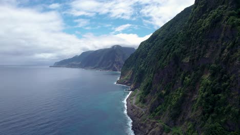 Massive-steep-rock-cliffs-of-Madeira-coastline-above-Atlantic-Ocean