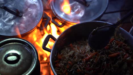 Closeup-of-the-food-cooking-in-the-pan-own-top-of-the-Acatenango-vulcano-in-Antigua,-Guatemala