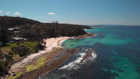 Aerial-view-over-the-Hyams-Beach-in-Jervis-bay,-NSW,-Australia---reverse,-drone-shot