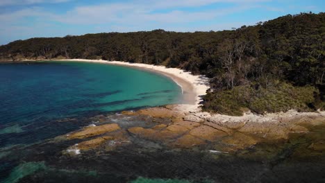 Aerial-view-over-the-Murrays-beach-in-Jervis-bay,-New-South-Wales,-Australia