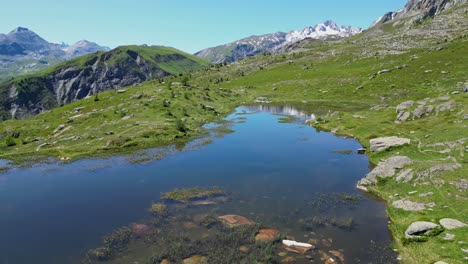 Mountain-Lake-Lac-Guichard-in-French-Alps---Aerial-Pedestal-Up