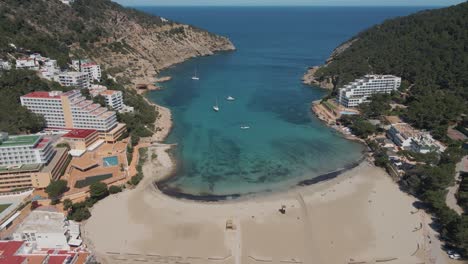 Aerial-view-over-the-Cala-Llonga-bay-in-Ibiza,-Spain