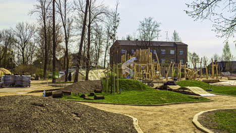 Time-lapse-of-various-workers-laying-turf-on-the-mounds-in-a-park