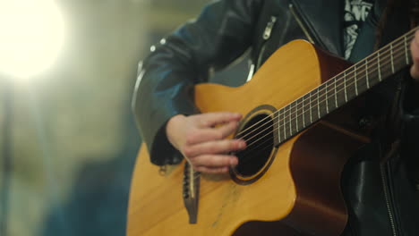 Closeup-of-playing-the-acoustic-guitar