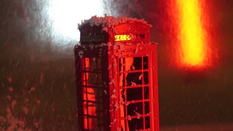 Snowing-on-an-English-phone-booth