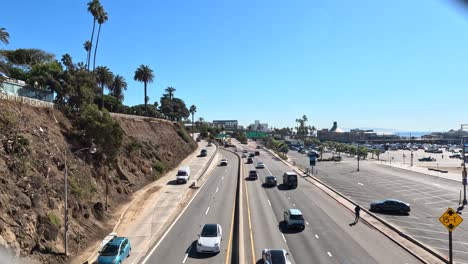 Traffic-along-the-Pacific-Coast-Highway--1-near-Santa-Monica,-California-on-a-typical-day---view-from-an-overpass