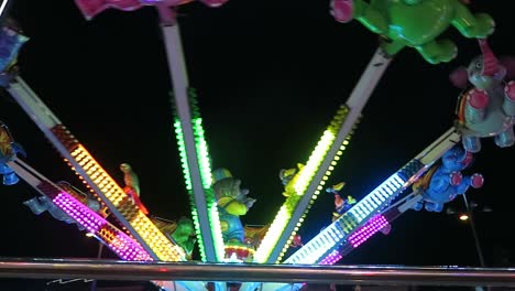 A-children's-ride-at-a-amusement-fair-at-night