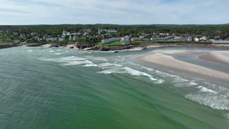 Aerial-establishing-shot-of-rocky-New-England-coast-line-with-waves-crashing