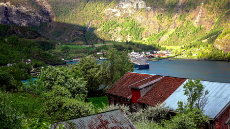 Time-lapse-of-luxury-cruise-liner-ship-sailing-towards-its-destination-at-fjords-of-Aurland,-Norway