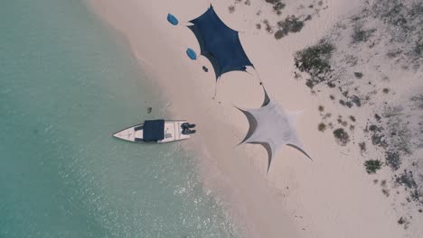 Aerial-top-view-tropical-island-luxury-beach-camp-glamping,-Los-Roques-Venezuela