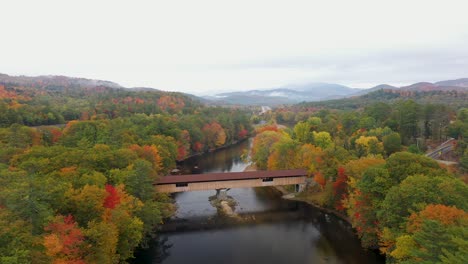 Covered-bridge-drone-shot-in-New-Hampshire-during-fall-in-White-Mountains