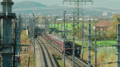 A-high-speed-Train-running-through-an-industrial-area-in-Austria