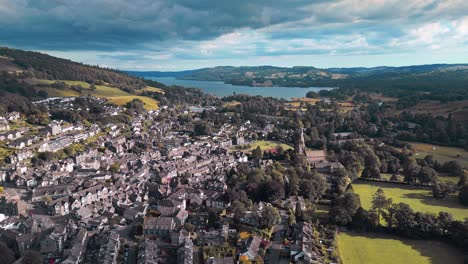 Aerial-footage-of-the-quite-village-of-Ambleside-showing-St-Mary’s-Church-and-Lake-Windermere-in-the-distance
