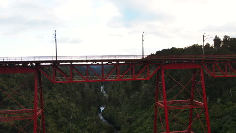 Makatote-viaduct-metal-train-bridge-spanning-forest-ravine-and-river-in-New-Zealand