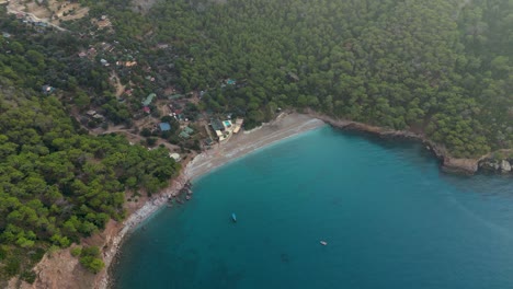 paradise-beach-with-blue-water-surrounded-by-mountain---Kabak,-Turkey