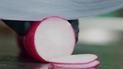 Close-up-of-slicing-fresh-radish