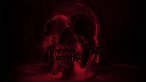 Blood-Red-Skull-on-Black-Background,-Rotating-with-Smoke-and-Mist