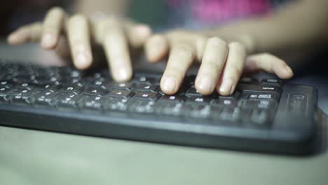 Hands-of-an-office-woman-typing