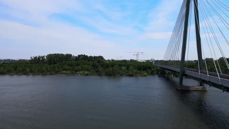 Aerial-view-of-Donaustadt-Bridge-Railway-Cable-stayed-Bridge-Across-the-Danube-River-in-Vienna