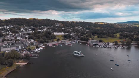 Aerial-footage-of-Bowness-on-Windermere-a-sprawling-tourist-town-on-the-shore-of-Windermere-Lake,-Cumbria