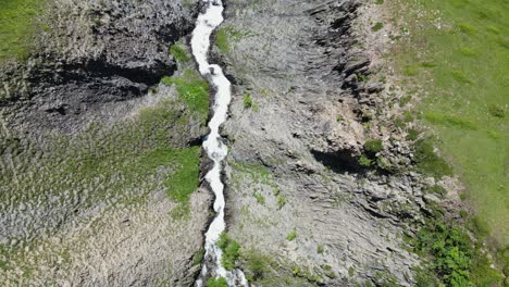 River-Waterfall-in-French-Alps,-Isere-Savoy,-France---Aerial-Top-Down