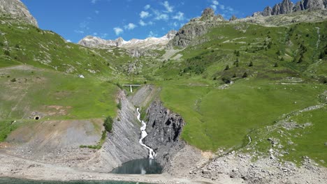 Le-Rieu-Claret-River-Waterfall-in-French-Alps---Aerial-Dolly-Forward