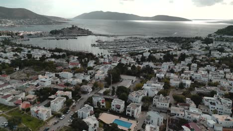aerial-view-of-the-city-of-Bodrum,-Turkey---white-houses-and-marina-in-the-view
