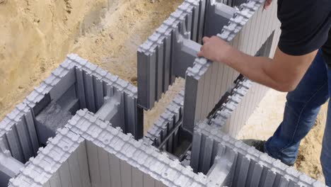 Joining-ICF-blocks-construction-site