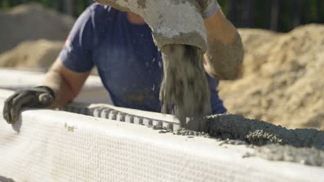 Pouring-cement-in-ICF-block